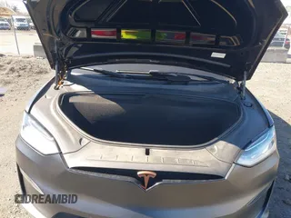 2022 Tesla Model X with VIN 7SAXCDE52NF345835, listed as a IAAI auction lot 41823522 with 24,401 mi miles and . Bid and sale history available at DreamBid. Image 10.