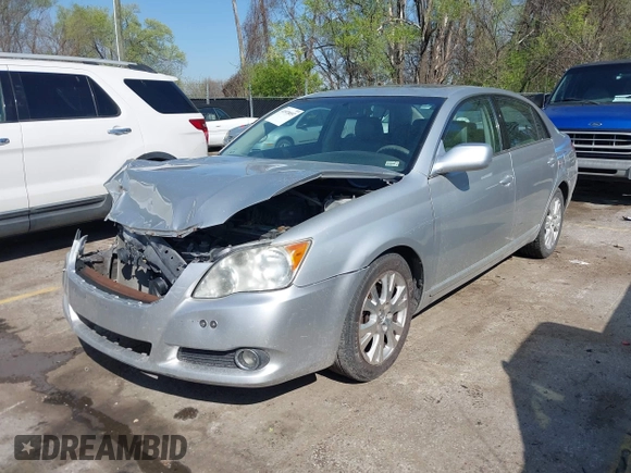 2008 Toyota Avalon XL with VIN 4T1BK36B18U265412, listed as a IAAI auction lot 41978057 with 212,062 mi miles. Bid and sale history available at carsss.com. Image 2.