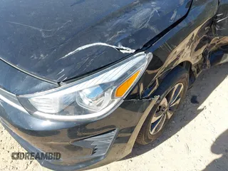 2022 Kia Rio LX z VIN 3KPA24AD9NE458402, wystawiony jako IAAI lot #42046422 z przebiegiem 30 137 mil mil oraz . Historia ofert i sprzedaży dostępna na DreamBid. Obrazek 6.