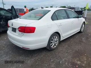 2014 Volkswagen Jetta SE with VIN 3VWD07AJ2EM239987, listed as a IAAI auction lot 42555560 with 115,987 mi miles and . Bid and sale history available at DreamBid. Image 4.