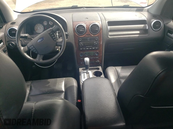 2007 Ford Freestyle Limited z VIN 1FMDK06197GA05867, wystawiony jako Copart lot #58016345 z przebiegiem 173 142 mil mil oraz Szkody całkowita. Historia ofert i sprzedaży dostępna na DreamBid. Obrazek 8.