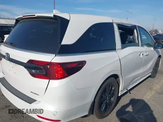 2023 Honda Odyssey Sport z VIN 5FNRL6H77PB011088, wystawiony jako IAAI lot #41883596 z przebiegiem 80 528 mil mil oraz . Historia ofert i sprzedaży dostępna na DreamBid. Obrazek 6.