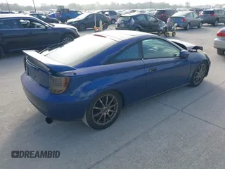 2002 Toyota Celica GT with VIN JTDDR32T220113449, listed as a IAAI auction lot 41546615 with 247,392 mi miles. Bid and sale history available at carsss.com. Image 4.