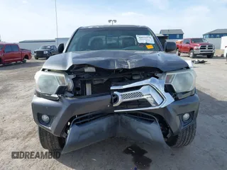 2014 Toyota Tacoma PreRunner with VIN 3TMJU4GN1EM156845, listed as a IAAI auction lot 40972570 with 65,138 mi miles. Bid and sale history available at carsss.com. Image 6.