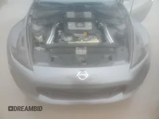 2015 Nissan 370Z Nismo z VIN JN1AZ4EH0FM444256, wystawiony jako Copart lot #54620065 z przebiegiem 78 626 mil mil oraz Szkoda całkowita • Salvage title. Historia ofert i sprzedaży dostępna na DreamBid. Obrazek 11.