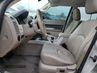 2009 Mercury Mariner Premier z VIN 4M2CU87739KJ21572, wystawiony jako Copart lot #83665504 z przebiegiem 181 858 mil mil oraz Szkoda całkowita • Salvage title. Historia ofert i sprzedaży dostępna na DreamBid. Obrazek 7.