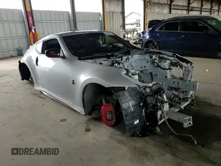 2015 Nissan 370Z Nismo z VIN JN1AZ4EH1FM441060, wystawiony jako Copart lot #53423725 z przebiegiem Nie podano mil oraz Szkoda całkowita • Salvage title. Historia ofert i sprzedaży dostępna na DreamBid. Obrazek 10.