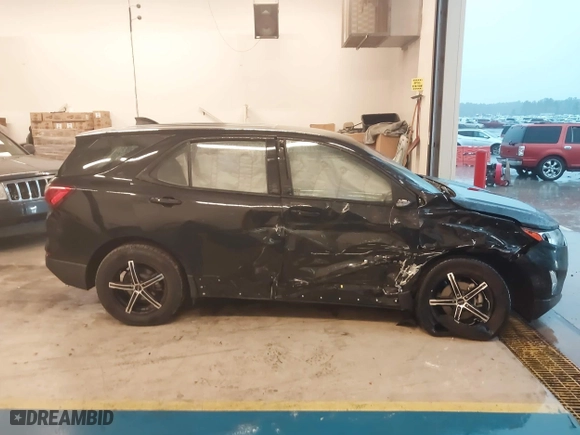 2019 Chevrolet Equinox LS with VIN 3GNAXHEV0KL147077, listed as a IAAI auction lot 41572529 with 56,817 mi miles. Bid and sale history available at carsss.com. Image 13.