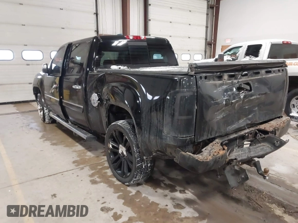 2011 GMC Sierra 1500 Denali z VIN 3GTP2XE2XBG128854, wystawiony jako IAAI lot #41606670 z przebiegiem 150 556 mil mil oraz . Historia ofert i sprzedaży dostępna na DreamBid. Obrazek 3.
