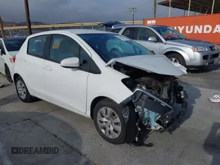 2012 Toyota Yaris L with VIN JTDKTUD35CD505430, listed as a IAAI auction lot 42162365 with 10,948 mi miles. Bid and sale history available at carsss.com. Image 1.