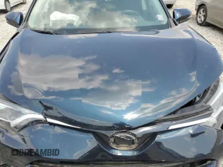 2018 Toyota RAV4 XLE with VIN 2T3WFREVXJW483012, listed as a Copart auction lot 58806205 with 48,266 mi miles and Salvage title. Bid and sale history available at DreamBid. Image 12.