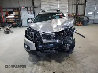 2013 Kia Sorento LX z VIN 5XYKT3A62DG348239, wystawiony jako Copart lot #52022165 z przebiegiem Nie podano mil oraz Szkoda całkowita • Salvage title. Historia ofert i sprzedaży dostępna na DreamBid. Obrazek 12.