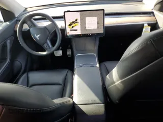 2022 Tesla Model Y Performance z VIN 7SAYGDEF5NF338301, wystawiony jako Copart lot #78189114 z przebiegiem 55 881 mil mil oraz Szkody całkowita. Historia ofert i sprzedaży dostępna na DreamBid. Obrazek 8.