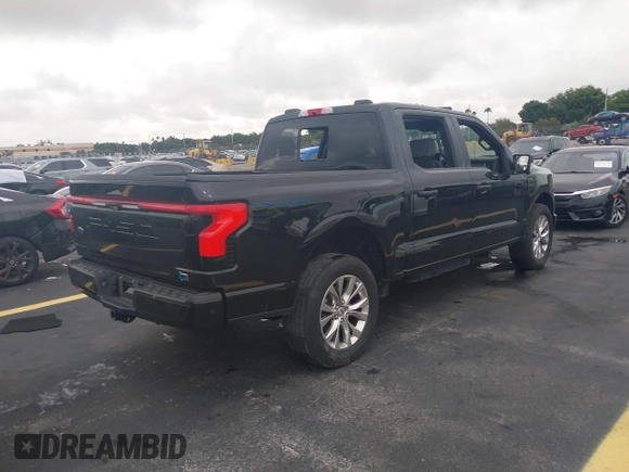 2023 Ford F-150 Lightning Pro with VIN 1FT6W1EV3PWG08587, listed as a IAAI auction lot 42418036 with Not provided miles and . Bid and sale history available at DreamBid. Image 4.