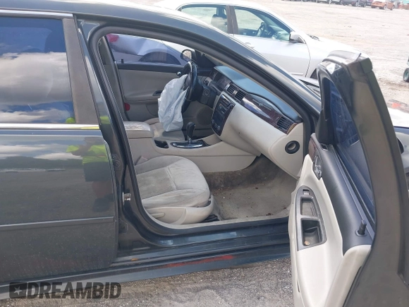 2014 Chevrolet Impala LT with VIN 2G1WB5E31E1146318, listed as a IAAI auction lot 40413281 with 422,345 mi miles and . Bid and sale history available at DreamBid. Image 5.