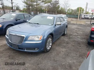 2011 Chrysler 300 with VIN 2C3CA6CT5BH575023, listed as a IAAI auction lot 42090856 with 200,309 mi miles. Bid and sale history available at carsss.com. Image 2.