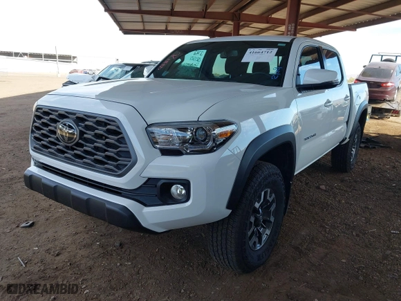 2023 Toyota Tacoma 4WD SR with VIN 3TMCZ5AN8PM650793, listed as a IAAI auction lot 41664712 with 9,427 mi miles. Bid and sale history available at carsss.com. Image 18.