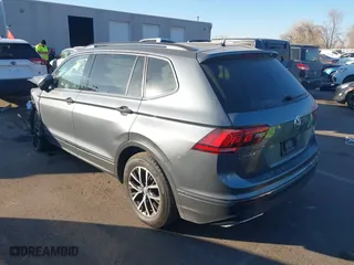 2020 Volkswagen Tiguan SE with VIN 3VV2B7AX9LM151977, listed as a IAAI auction lot 41448053 with 69,194 mi miles. Bid and sale history available at carsss.com. Image 3.