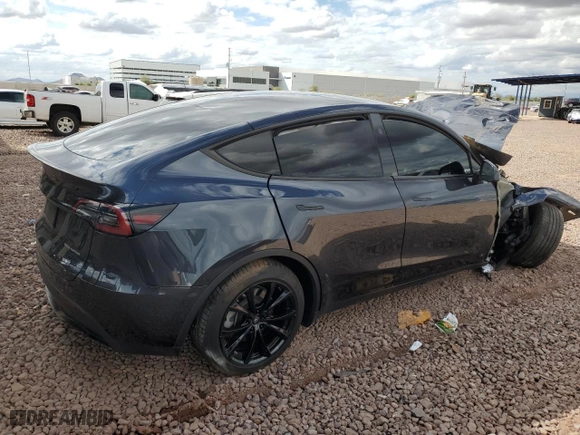 2024 Tesla Model Y Long Range with VIN 7SAYGDEEXRA223543, listed as a Copart auction lot 48691375 with 0 mi miles and Salvage Title. Bid and sale history available at carsss.com. Image 3.
