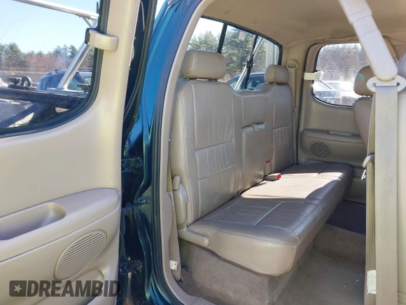 2000 Toyota Tundra Limited with VIN 5TBBT4815YS065867, listed as a IAAI auction lot 41995501 with 208,889 mi miles. Bid and sale history available at carsss.com. Image 8.