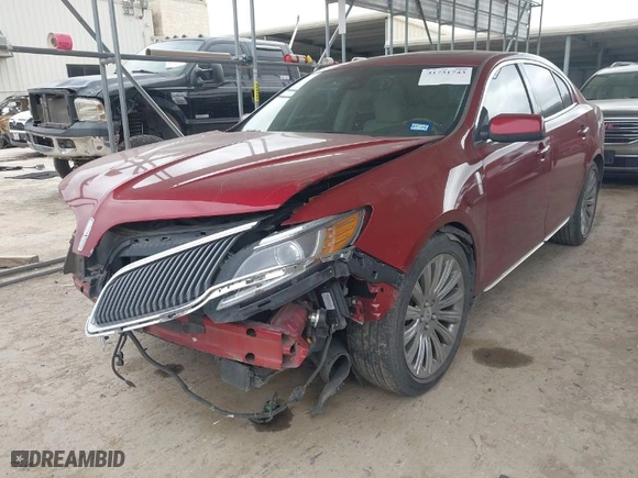 2013 Lincoln MKS with VIN 1LNHL9DK9DG601703, listed as a IAAI auction lot 41751743 with 101316 miles. Bid and sale history available at carsss.com. Image 2.