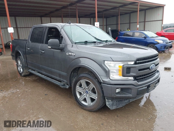 2019 Ford F-150 XL with VIN 1FTEW1C56KKC31025, listed as a IAAI auction lot 41452618 with 153,422 mi miles and . Bid and sale history available at DreamBid. Image 1.