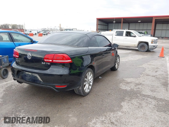 2014 Volkswagen Eos Komfort with VIN WVWBW8AH4EV007229, listed as a IAAI auction lot 41894160 with 66,984 mi miles and . Bid and sale history available at DreamBid. Image 4.