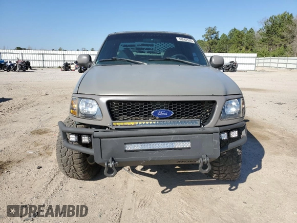 1999 Ford F-150 with VIN 1FTRX17W1XNC25527, listed as a Copart auction lot 48662525 with 150,544 mi miles and Salvage Title. Bid and sale history available at DreamBid. Image 5.
