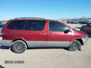 2002 Toyota Sienna CE with VIN 4T3ZF19C52U463405, listed as a IAAI auction lot 41658109 with 138,726 mi miles. Bid and sale history available at carsss.com. Image 13.