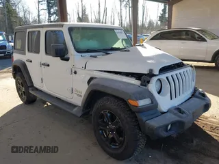 2020 Jeep Wrangler Unlimited Sport Altitude with VIN 1C4HJXDN3LW220751, listed as a IAAI auction lot 41550452 with 84,489 mi miles and . Bid and sale history available at DreamBid. Image 1.