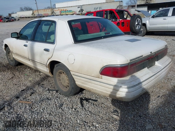 1997 Mercury Grand Marquis LS with VIN 2MELM75W5VX715872, listed as a IAAI auction lot 41612631 with 202,743 mi miles and . Bid and sale history available at DreamBid. Image 3.