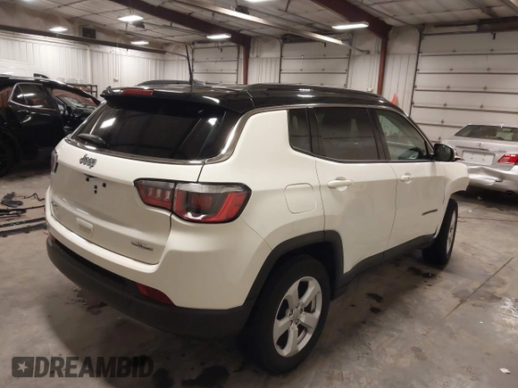 2019 Jeep Compass Latitude with VIN 3C4NJDBB0KT834607, listed as a IAAI auction lot 41932794 with 74,694 mi miles. Bid and sale history available at carsss.com. Image 4.