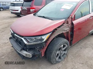 2018 Honda CR-V EX with VIN 2HKRW1H52JH523178, listed as a IAAI auction lot 41699500 with 81,377 mi miles and . Bid and sale history available at carsss.com. Image 6.