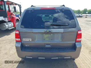 2012 Ford Escape XLT with VIN 1FMCU9D75CKC22907, listed as a IAAI auction lot 42571195 with 198,537 mi miles and . Bid and sale history available at DreamBid. Image 16.