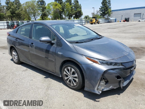 2021 Toyota Prius LE z VIN JTDKAMFPXM3174518, wystawiony jako Copart lot #58854495 z przebiegiem 83 445 mil mil oraz Szkoda całkowita • Salvage title. Historia ofert i sprzedaży dostępna na DreamBid. Obrazek 4.