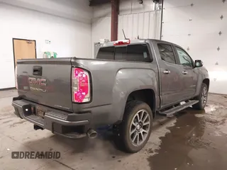 2021 GMC Canyon 4WD Denali with VIN 1GTG6EEN4M1287194, listed as a IAAI auction lot 41571729 with 21,704 mi miles. Bid and sale history available at carsss.com. Image 4.