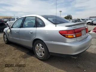 2001 Saturn LS z VIN 1G8JW54R01Y528238, wystawiony jako Copart lot #50344355 z przebiegiem 90 854 mil mil oraz Szkody całkowita. Historia ofert i sprzedaży dostępna na DreamBid. Obrazek 2.
