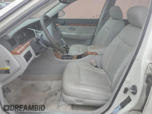 2004 Kia Amanti z VIN KNALD124645042962, wystawiony jako Copart lot #78897374 z przebiegiem 182 054 mil mil oraz Tytuł czysty. Historia ofert i sprzedaży dostępna na DreamBid. Obrazek 7.