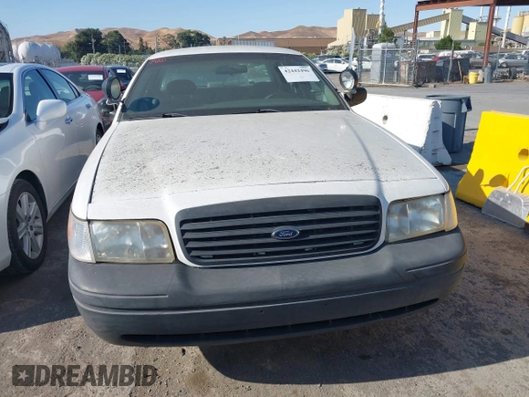 2000 Ford Crown Victoria Police Interceptor z VIN 2FAFP71W7YX104263, wystawiony jako IAAI lot #42442496 z przebiegiem 153 064 mil mil oraz . Historia ofert i sprzedaży dostępna na DreamBid. Obrazek 12.