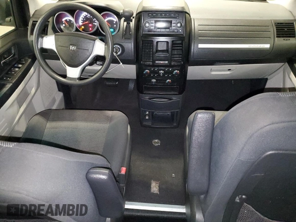 2009 Dodge Grand Caravan SE z VIN 2D8HN44E99R542025, wystawiony jako Copart lot #61003595 z przebiegiem 222 476 mil mil oraz Szkoda całkowita • Salvage title. Historia ofert i sprzedaży dostępna na DreamBid. Obrazek 8.