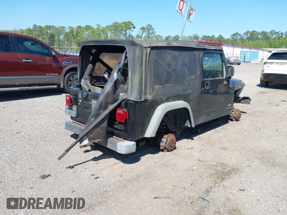 2005 Jeep Wrangler Unlimited with VIN 1J4FA44S25P385421, listed as a IAAI auction lot 42039381 with 1 mi miles. Bid and sale history available at carsss.com. Image 4.