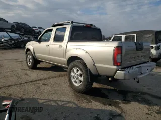 2003 Nissan Frontier SVE with VIN 1N6MD27Y23C411946, listed as a Copart auction lot 88362135 with 157,105 mi miles and Clean title. Bid and sale history available at DreamBid. Image 2.