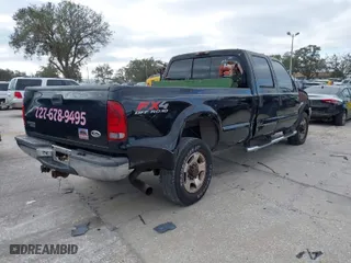 2003 Ford Super Duty F-350 SRW XL with VIN 1FTSW31P63EC30525, listed as a IAAI auction lot 41164415 with 261,844 mi miles. Bid and sale history available at carsss.com. Image 4.