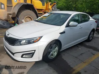 2015 Kia Optima LX with VIN KNAGM4A79F5555866, listed as a IAAI auction lot 42223745 with 115,504 mi miles and . Bid and sale history available at DreamBid. Image 2.