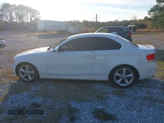 2009 BMW 1 Series 128i with VIN WBAUP93579VF49106, listed as a IAAI auction lot 41443690 with Not provided miles and . Bid and sale history available at DreamBid. Image 14.