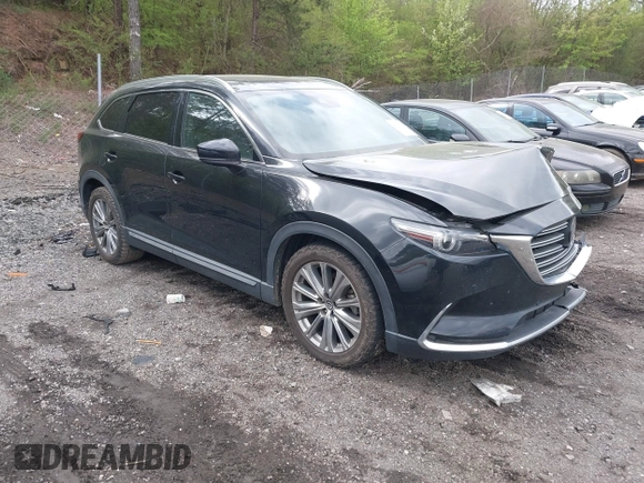 2021 Mazda CX-9 Carbon Edition with VIN JM3TCADY4M0517535, listed as a IAAI auction lot 41821261 with 60,053 mi miles. Bid and sale history available at carsss.com. Image 1.