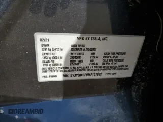 2021 Tesla Model Y Performance with VIN 5YJYGDEF0MF137692, listed as a Copart auction lot 55333395 with 56,325 mi miles and Salvage Title. Bid and sale history available at DreamBid. Image 12.