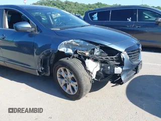 2015 Mazda CX-9 Sport z VIN JM3TB2BAXF0465720, wystawiony jako IAAI lot #42305436 z przebiegiem 130 543 mil mil oraz . Historia ofert i sprzedaży dostępna na DreamBid. Obrazek 6.
