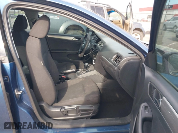 2015 Volkswagen Jetta Sedan 1.8T SE with VIN 3VWD17AJ0FM284070, listed as a IAAI auction lot 41853883 with 194,725 mi miles. Bid and sale history available at carsss.com. Image 5.