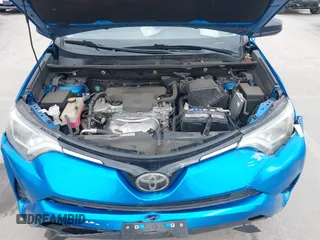 2018 Toyota RAV4 LE with VIN 2T3BFREV6JW740214, listed as a IAAI auction lot 42106349 with 105,831 mi miles and . Bid and sale history available at carsss.com. Image 10.